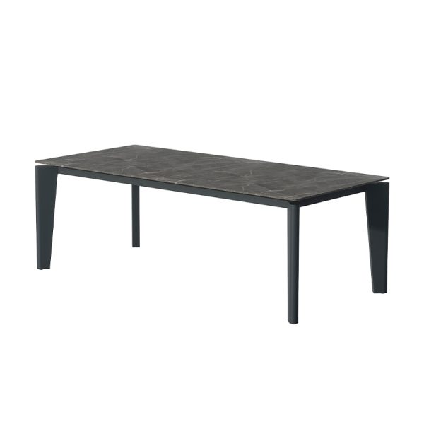 Mesa de cerámica rectangular en tono oscuro con superficie de acabado marmoleado y estructura metálica moderna.
